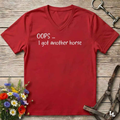 A red V-neck t-shirt with the white text 'OOPS .