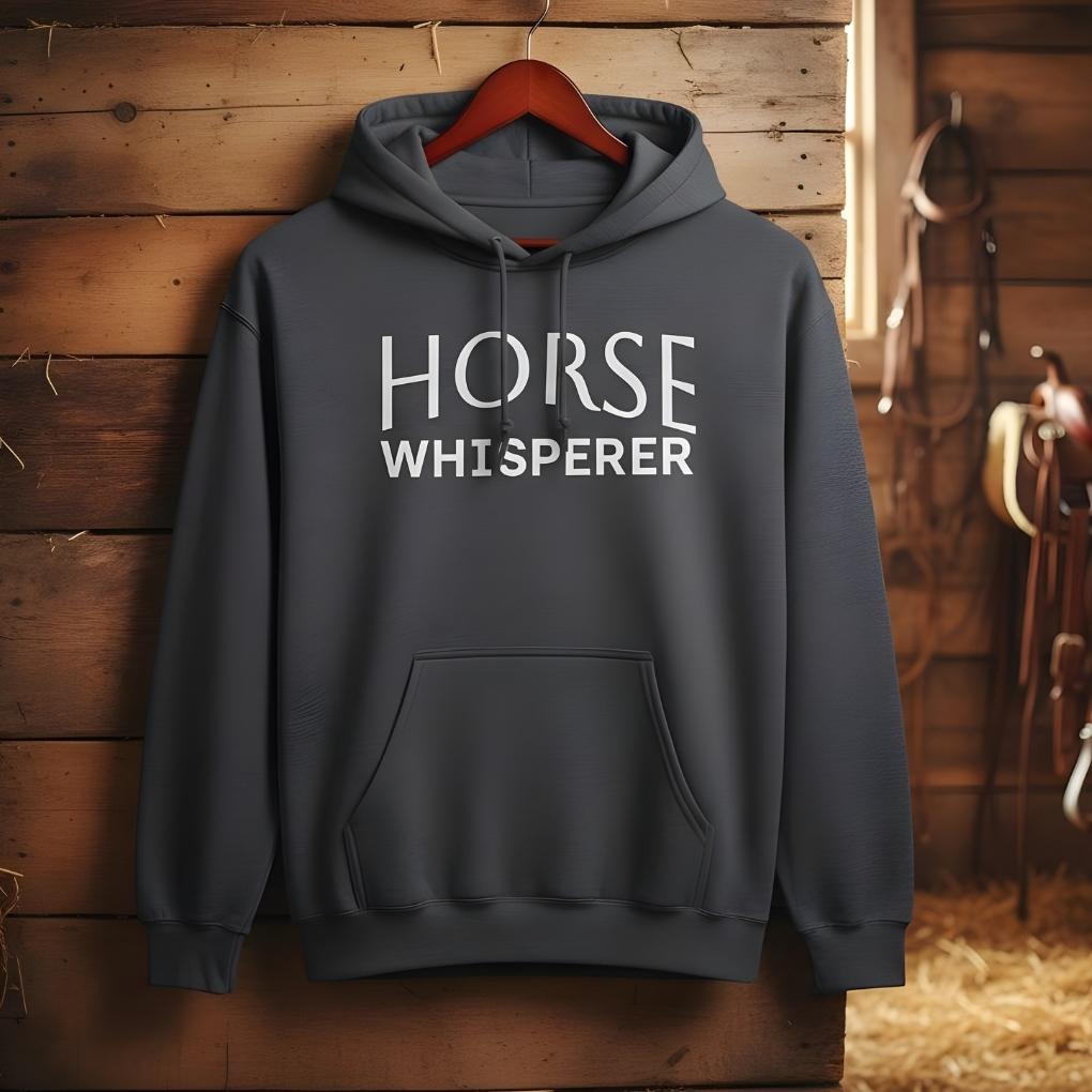 Gray hoodie with 'Horse Whisperer' text on a wooden background