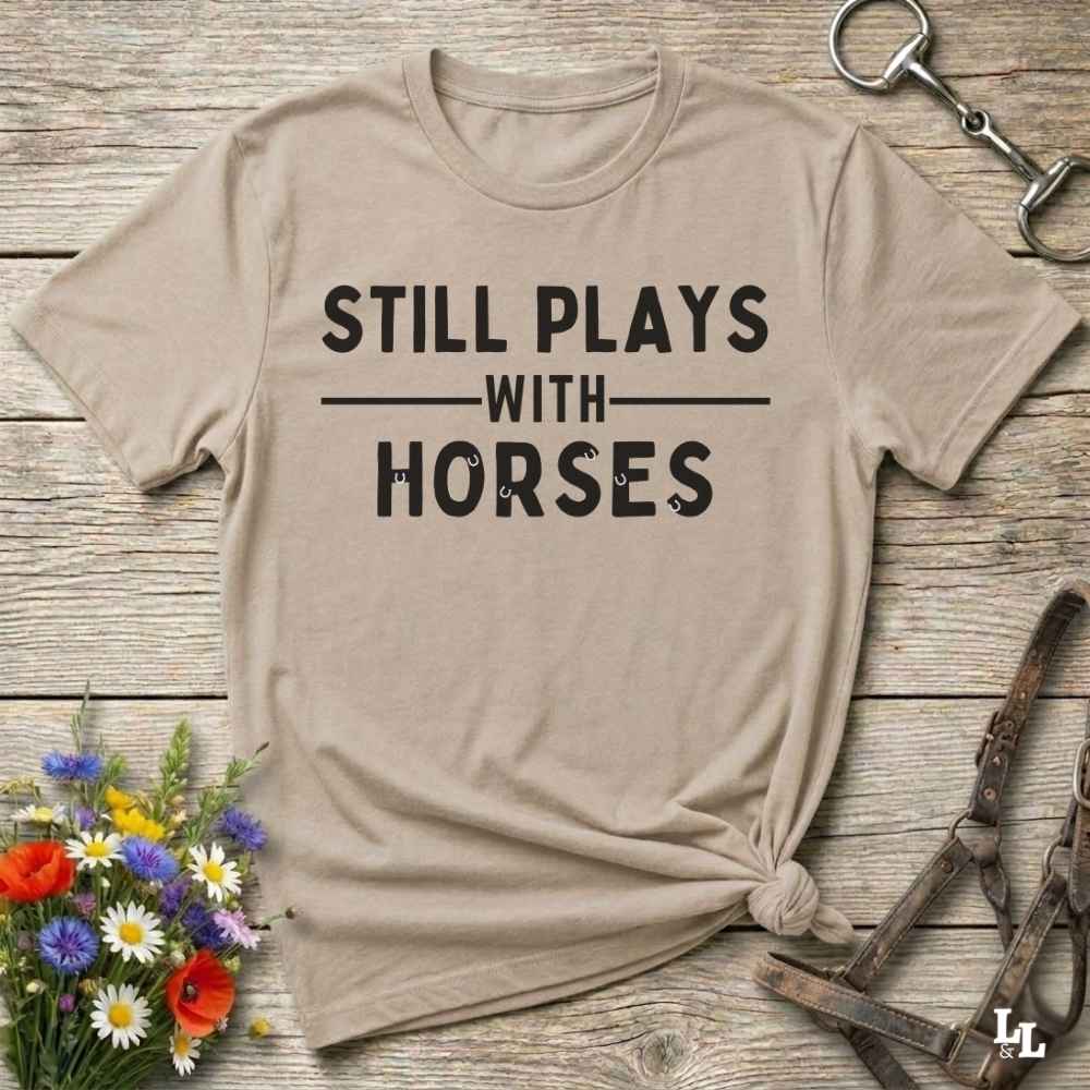 beige Fun western t-shirt for horse lovers and cowgirls. Western cowgirl graphic tee with horse design. Cowboy humor t-shirt for rodeo and country lovers. Horse lover funny t-shirt with western theme. Country style horse graphic tee for cowboys and cowgirls. Retro style funny western shirt for equestrians. Cute and funny country shirt with horse print. Southern cowgirl funny quote shirt for horse lovers. Still plays with horses.