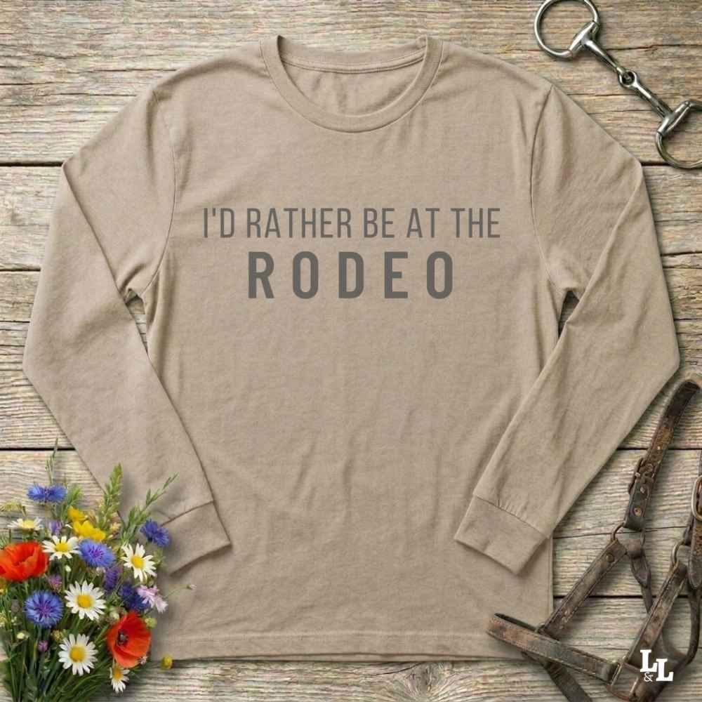 beige I'd Rather be a the Rodeo Long Sleeve Tee for Horse Riders, Equestrian Apparel. Perfect gift for horse people.