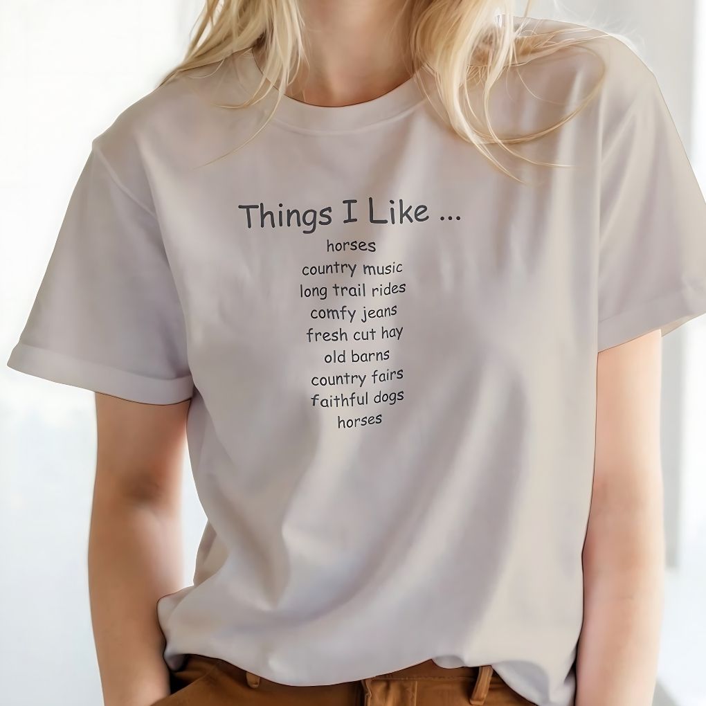 Person wearing a white t-shirt with text listing 'Things I Like' on a plain background. Things I Like T-Shirt for Horse Riders, Outdoor Wear Equestrian Apparel, Country Tee