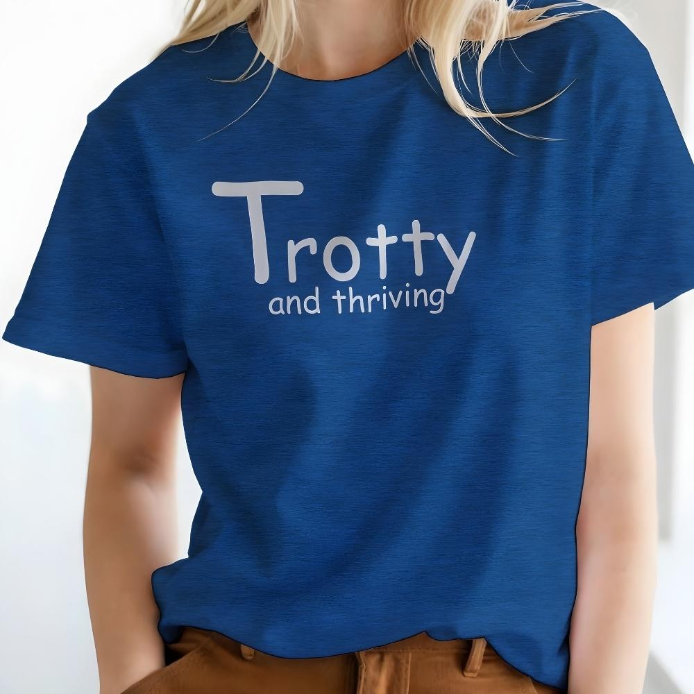 Person wearing a blue t-shirt with 'Trotty and thriving' text on a white background. Trotty and Thriving T-Shirt for Horse Lovers, Trail Riding Tee Equestrian Top, perfect gift for horse lovers, mothers day gift