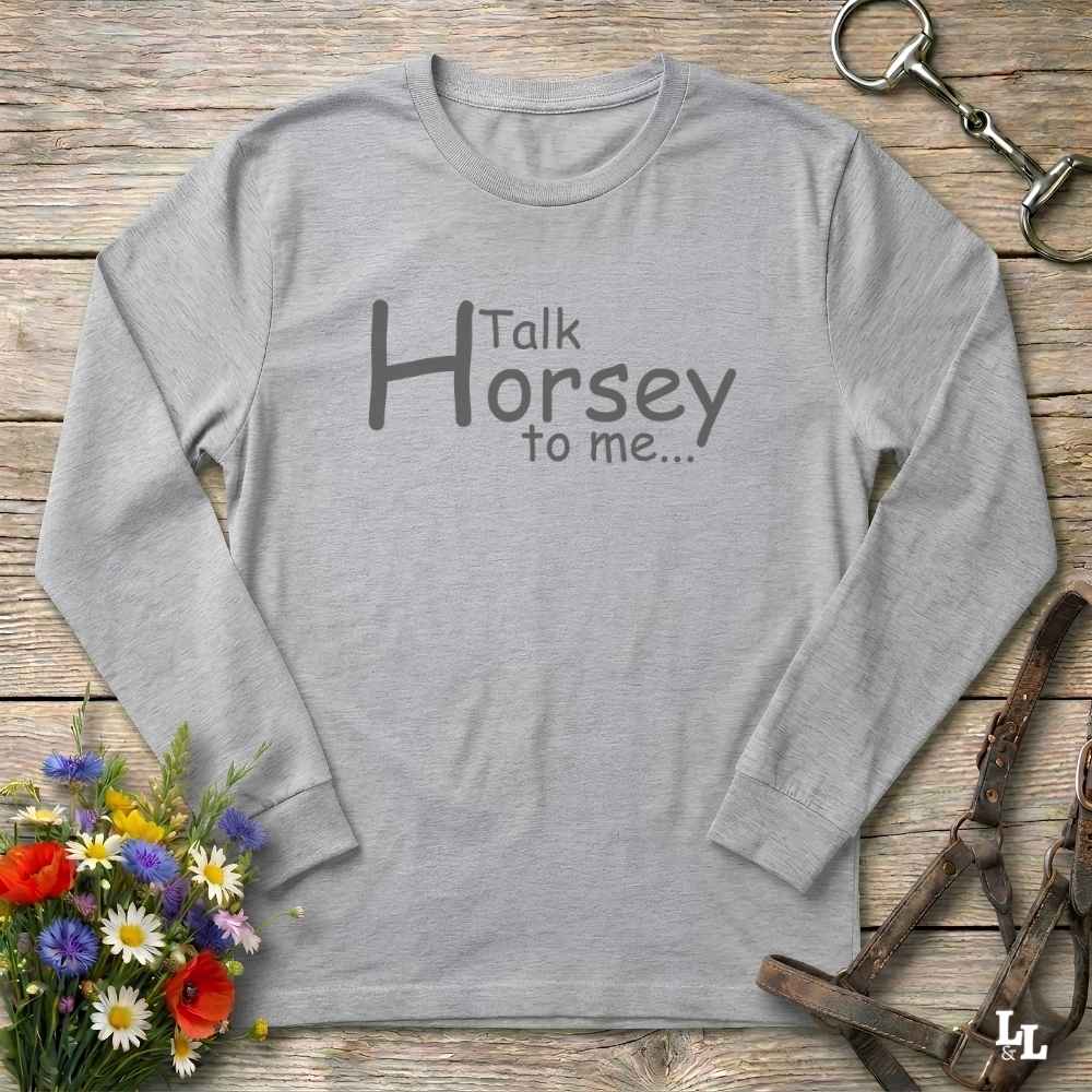 A light gray long-sleeve t-shirt with the text 'Talk Horsey to me.