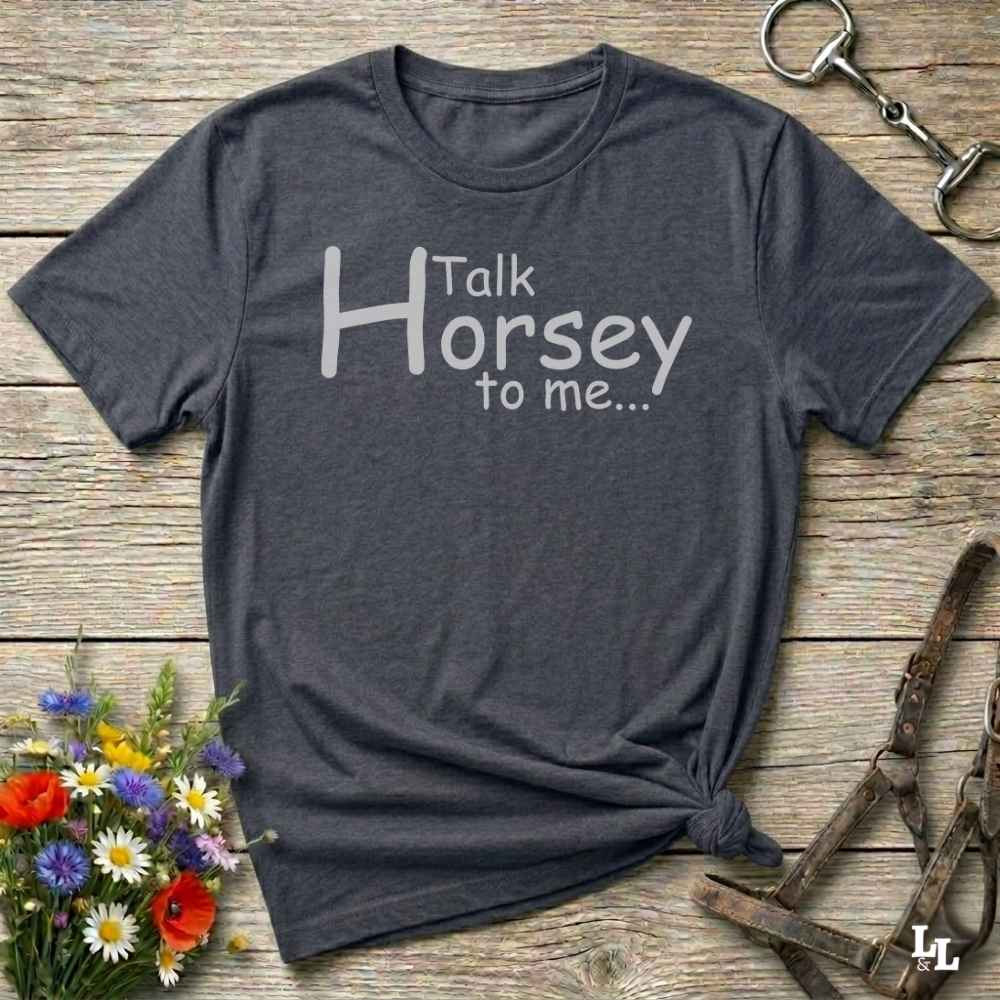 A dark heather gray t-shirt with the text 'Talk Horsey to me.