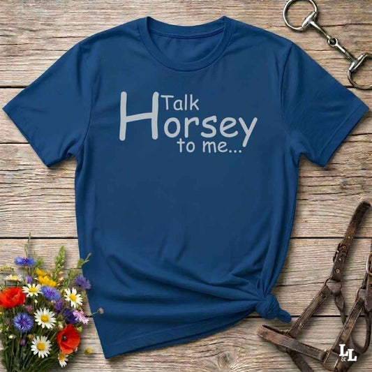 A navy blue short-sleeve t-shirt with the white printed text 'Talk Horsey to me.