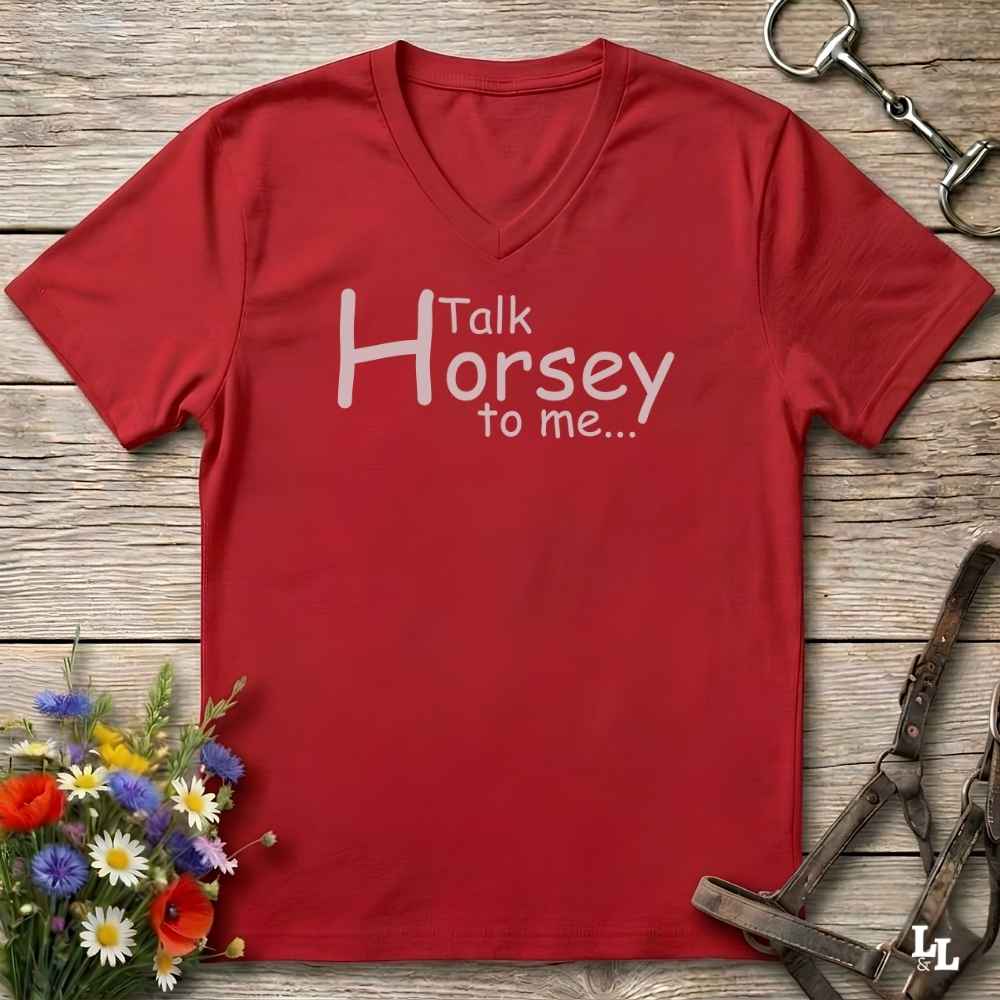 A red V-neck t-shirt with the white printed text 'Talk Horsey to me.