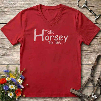 A red V-neck t-shirt with the white printed text 'Talk Horsey to me.