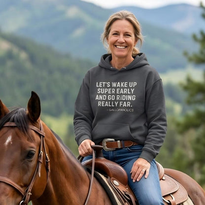 Person riding a horse with a scenic mountain background wearing a hoodie with text. Let's Wake up Super Early Hoodie for Horse Lovers, Cozy Barn Wear, Equestrian Hoodie. Perfect gift for horse lovers, birthday present for horse riders, mother's day gift for horse riders, father's day present for horse lovers