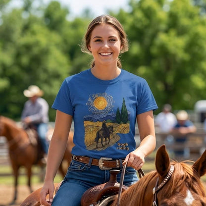 Woman riding a horse wearing a blue t-shirt with a graphic design. Gogh Riding T-Shirt for Horse Lovers, Horse Mom Shirt, Equestrian Wear, everyday barn wear, horse girl shirt, fathers day gift, mothers day