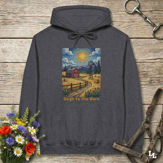 gray hoodie with a farm scene print on a wooden surface with flowers and horse equipment. Gogh to the Barn.