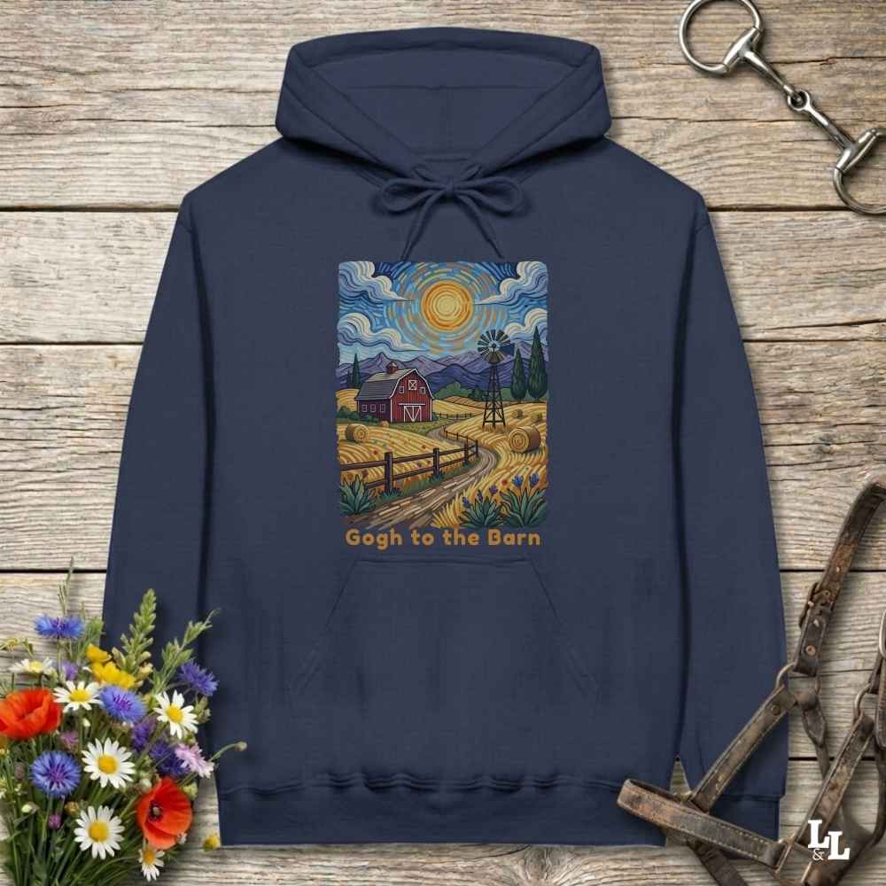 navy blue hoodie with a farm scene print on a wooden surface with flowers and horse equipment. Gogh to the Barn.