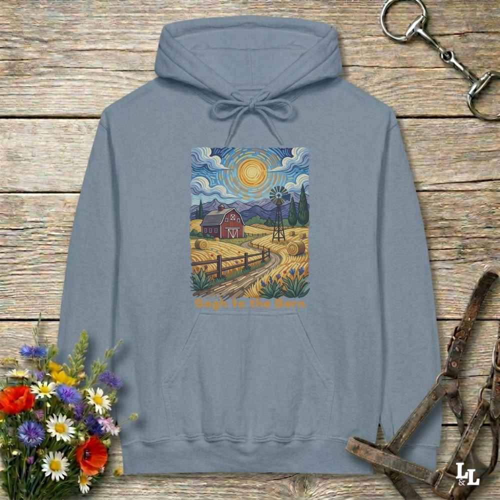 blue hoodie with a farm scene print on a wooden surface with flowers and horse equipment. Gogh to the Barn.