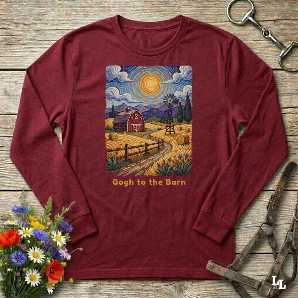 red long-sleeve shirt with a farm scene design and 'Gogh to the Barn' text on a wooden surface with flowers and tools. Perfect gift for horse lovers.