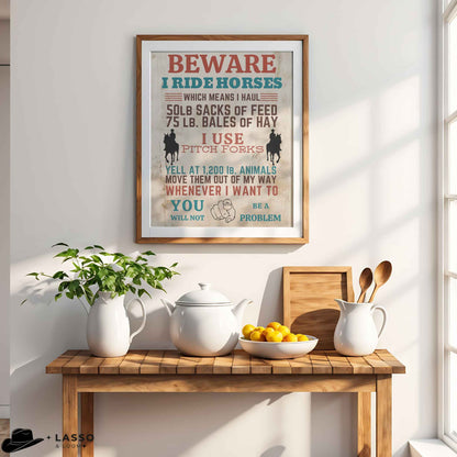 Rustic “Beware I Ride Horses” western print featuring bold typography and distressed finish, perfect for farmhouse wall decor. Country style horse lover artwork with western warning theme, ideal for entryway or barn wall display. Vintage western print.