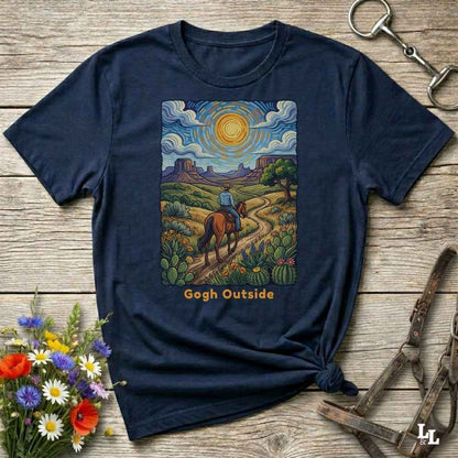 navy blue  t-shirt with a desert scene graphic and 'Gogh Outside' text on a wooden surface with flowers and a key. Perfect gift for horse lovers.