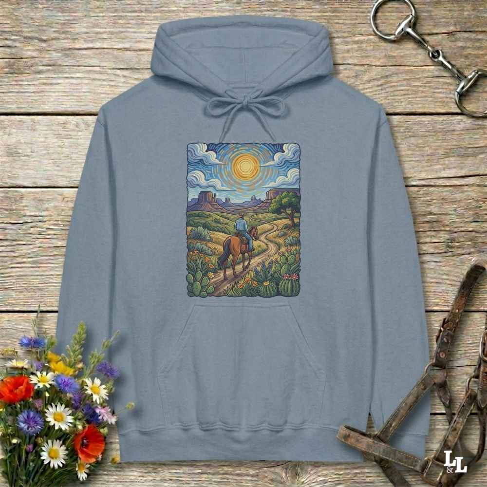 blue  Hoodie, Gogh Outside graphic design,  lying on wooden floor with equestrian halter and horse bit