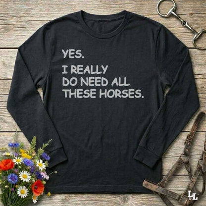Black long-sleeve shirt with text 'YES. I REALLY DO NEED ALL THESE HORSES.