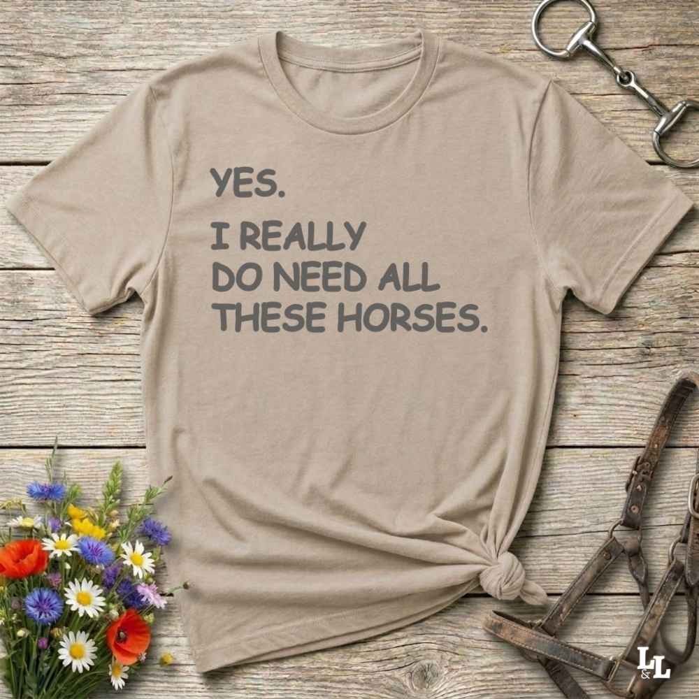Beige t-shirt with text 'YES. I REALLY DO NEED ALL THESE HORSES.
