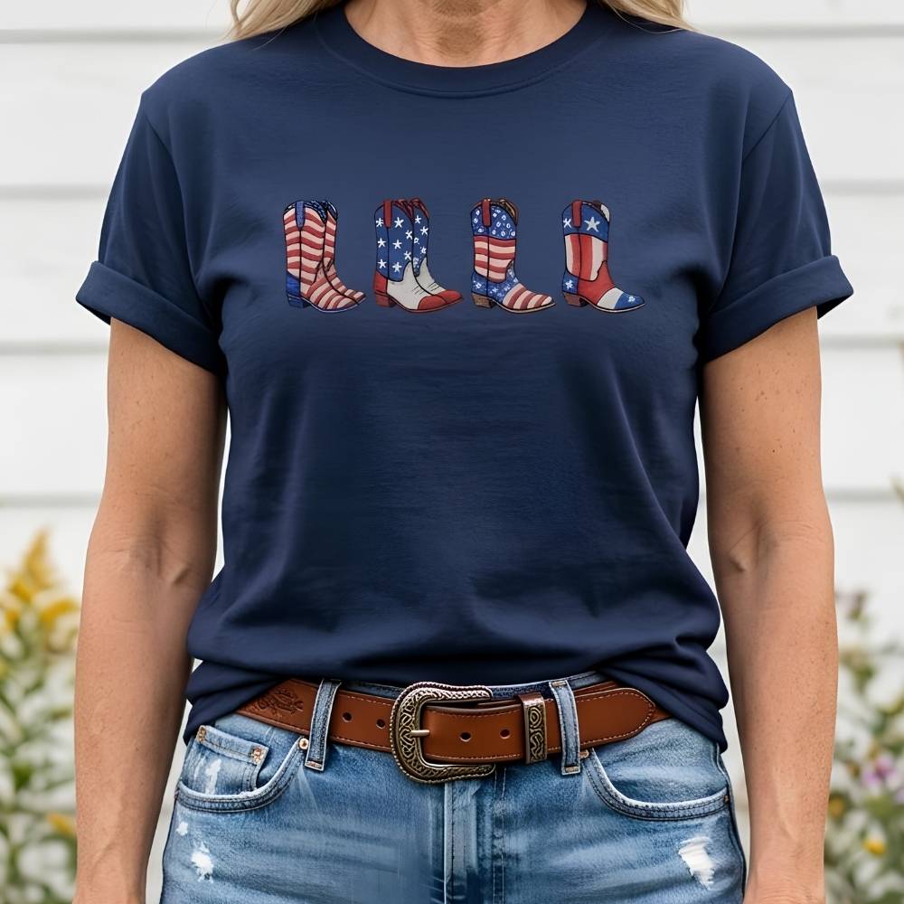 Person wearing a navy blue t-shirt with American flag cowboy boot design.