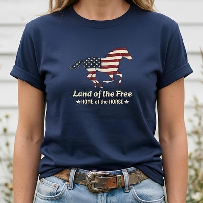 Navy blue t-shirt with American flag horse design and text worn by a person.