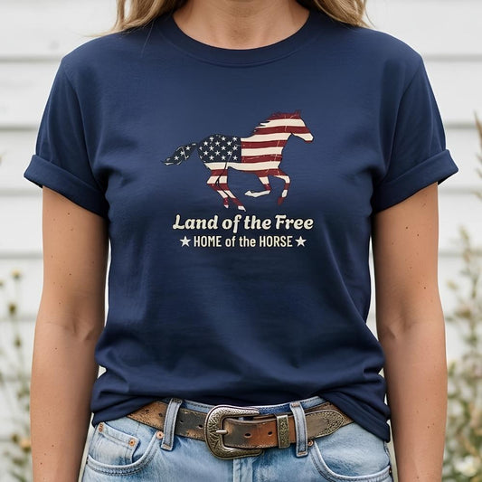 Navy blue t-shirt with American flag horse design and text worn by a person.