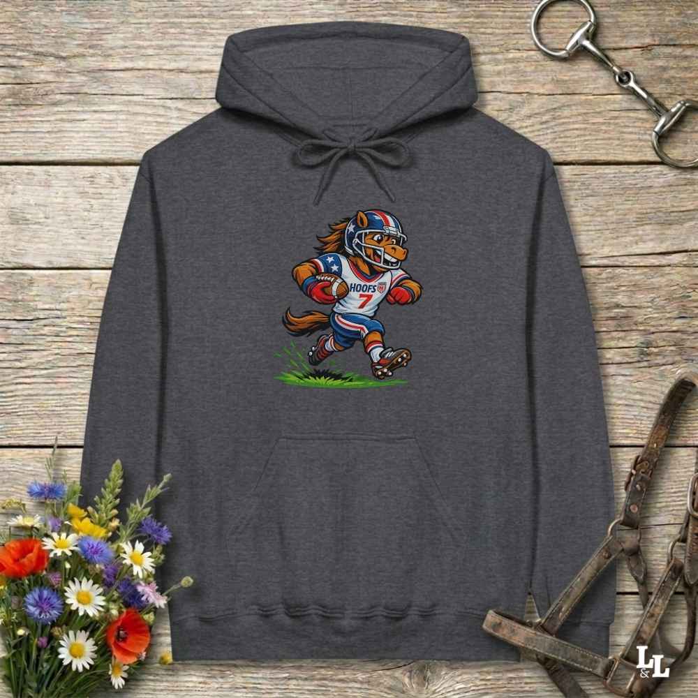 dark heather hoodie with horse mascot playing american football, lying on wooden background with equestrian accessories