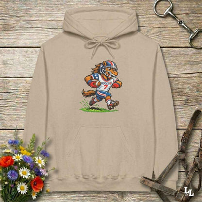 beige  hoodie with horse mascot playing american football, lying on wooden background with equestrian accessories
