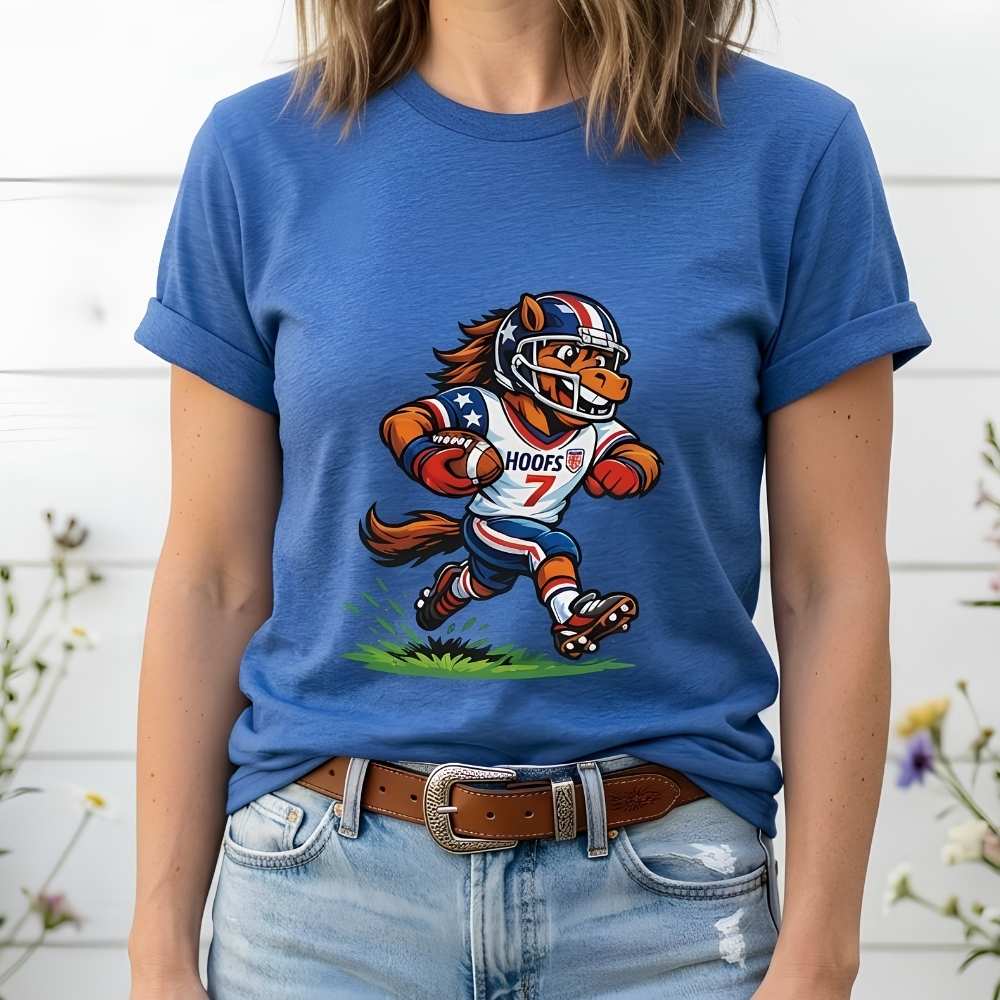 Person wearing a blue t-shirt with a cartoon horse graphic and text.