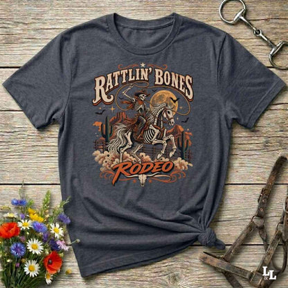 grey t-shirt with short sleeves, with halloween design of rattlin'bones rodeo, with skull cowboy riding a horse in the desert