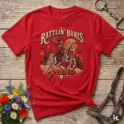 red t-shirt with short sleeves, with halloween design of rattlin'bones rodeo, with skull cowboy riding a horse in the desert