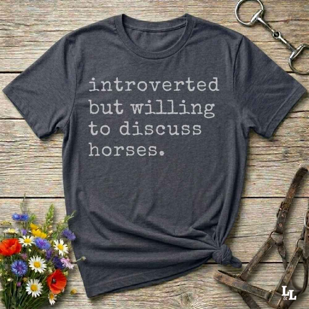 gray Funny horse lover t-shirt that reads ‘Introverted but willing to discuss horses’ in western typography