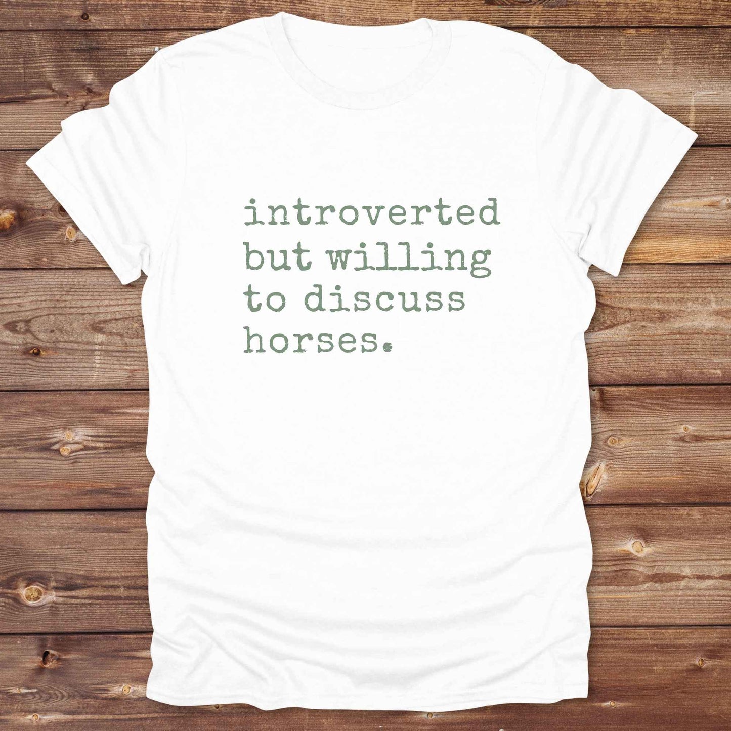 Fun western t-shirt for horse lovers and cowgirls. Western cowgirl graphic tee with horse design. Cowboy humor t-shirt for rodeo and country lovers. Horse lover funny t-shirt with western theme. Country style horse graphic tee for cowboys and cowgirls. Retro style funny western shirt for equestrians. Cute and funny country shirt with horse print. Southern cowgirl funny quote shirt for horse lovers. Introverted but willing to discuss horses.