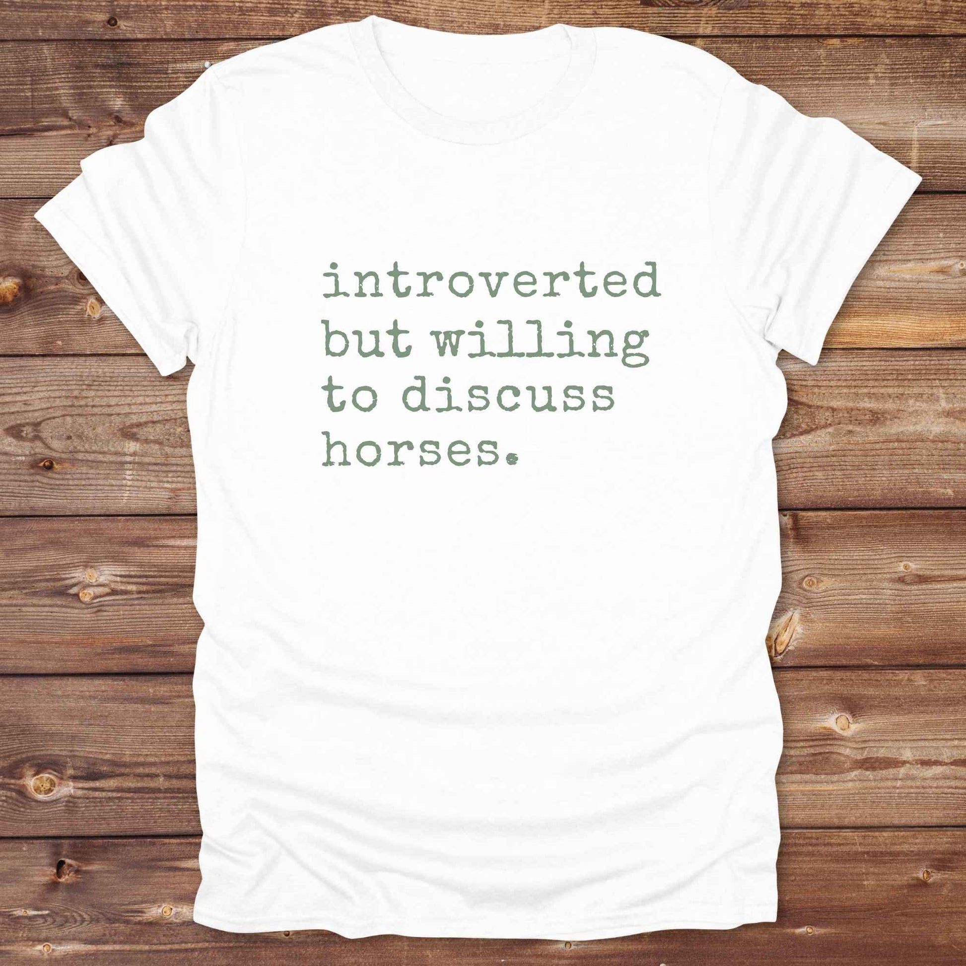 Fun western t-shirt for horse lovers and cowgirls. Western cowgirl graphic tee with horse design. Cowboy humor t-shirt for rodeo and country lovers. Horse lover funny t-shirt with western theme. Country style horse graphic tee for cowboys and cowgirls. Retro style funny western shirt for equestrians. Cute and funny country shirt with horse print. Southern cowgirl funny quote shirt for horse lovers. Introverted but willing to discuss horses.