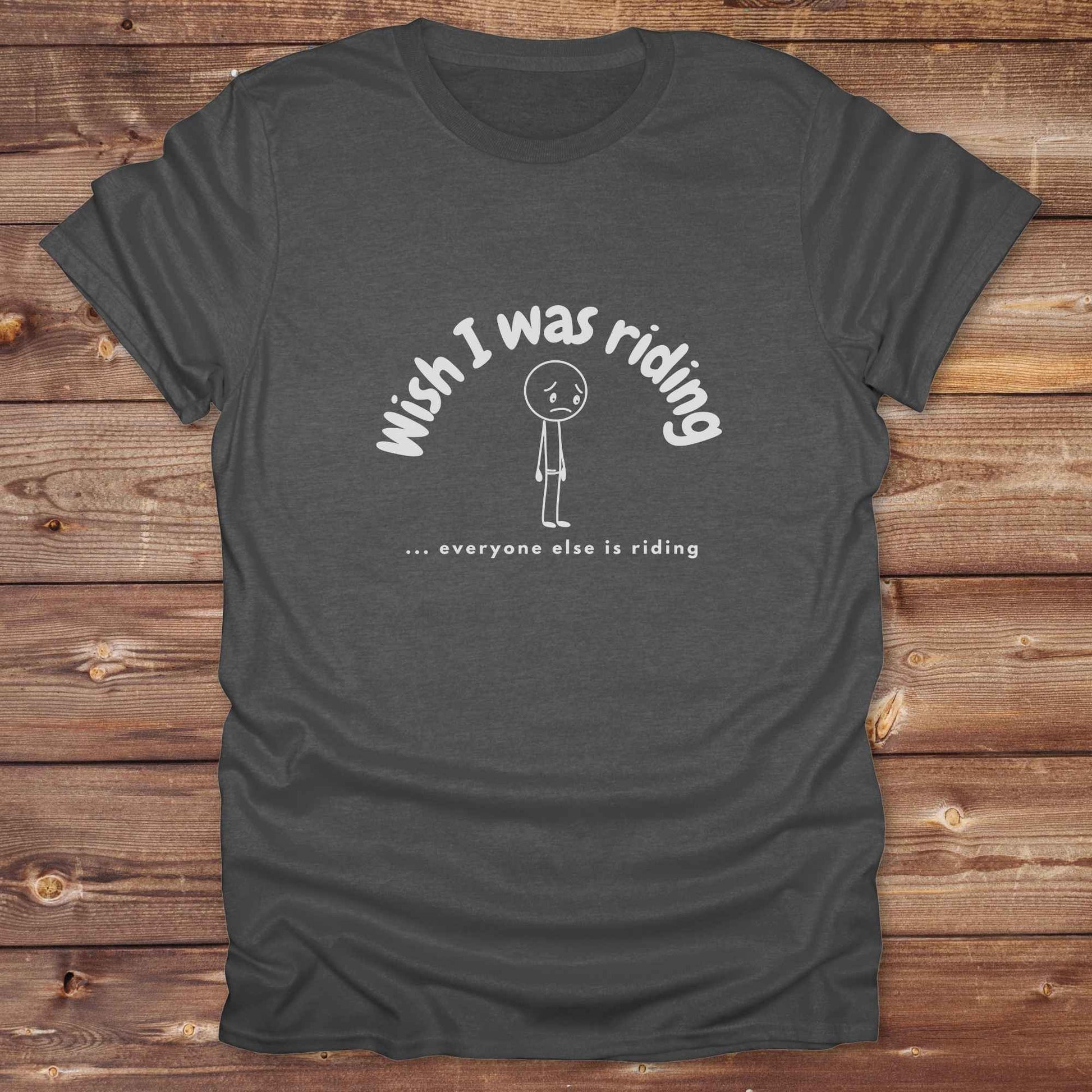 Fun western t-shirt for horse lovers and cowgirls. Western cowgirl graphic tee with horse design. Cowboy humor t-shirt for rodeo and country lovers. Horse lover funny t-shirt with western theme. Country style horse graphic tee for cowboys and cowgirls. Retro style funny western shirt for equestrians. Cute and funny country shirt with horse print. Southern cowgirl funny quote shirt for horse lovers. Wish I was riding everyone else is riding with sad person.