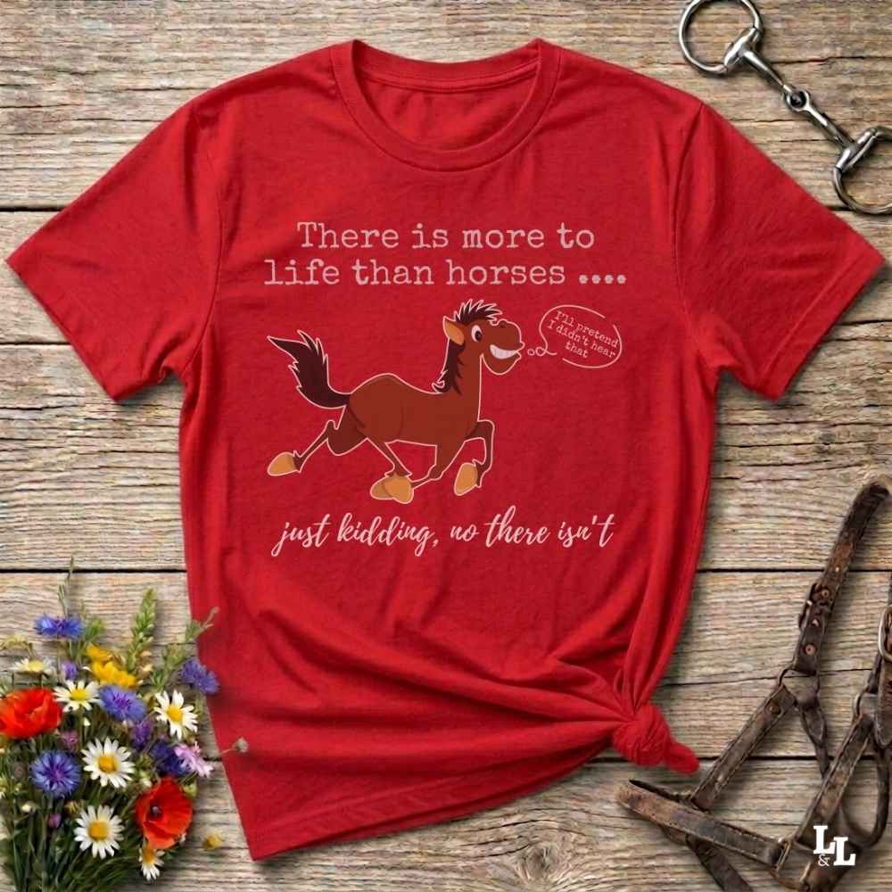 A red graphic t-shirt featuring a cartoon horse and the text 'There is more to life than horses .