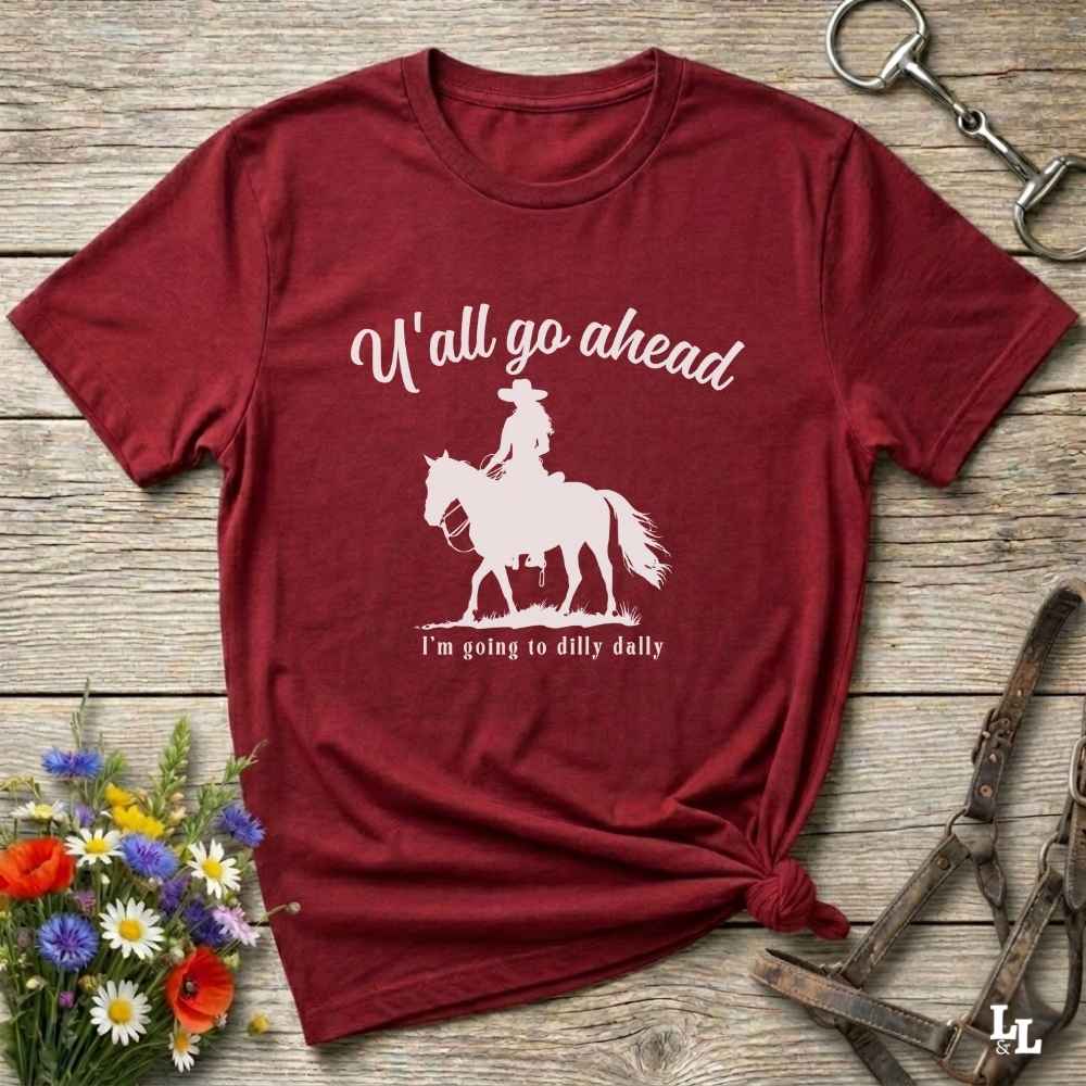 Fun western t-shirt for horse lovers and cowgirls. Western cowgirl graphic tee with horse design. Cowboy humor t-shirt for rodeo and country lovers. Horse lover funny t-shirt with western theme. Country style horse graphic tee for cowboys and cowgirls. Retro style funny western shirt for equestrians. Cute and funny country shirt with horse print. Southern cowgirl funny quote shirt for horse lovers. If Y'all go ahead.