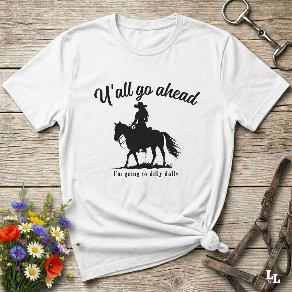 Fun western t-shirt for horse lovers and cowgirls. Western cowgirl graphic tee with horse design. Cowboy humor t-shirt for rodeo and country lovers. Horse lover funny t-shirt with western theme. Country style horse graphic tee for cowboys and cowgirls. Retro style funny western shirt for equestrians. Cute and funny country shirt with horse print. Southern cowgirl funny quote shirt for horse lovers. If Y'all go ahead.