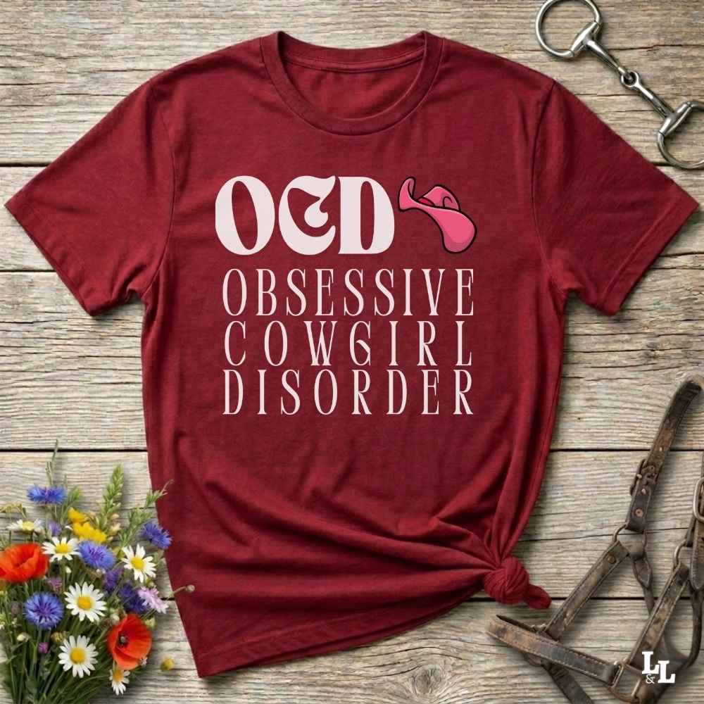 Fun western t-shirt for horse lovers and cowgirls. Western cowgirl graphic tee with horse design. Cowboy humor t-shirt for rodeo and country lovers. Horse lover funny t-shirt with western theme. Country style horse graphic tee for cowboys and cowgirls. Retro style funny western shirt for equestrians. Cute and funny country shirt with horse print. Southern cowgirl funny quote shirt for horse lovers. OCD Cowgirl.