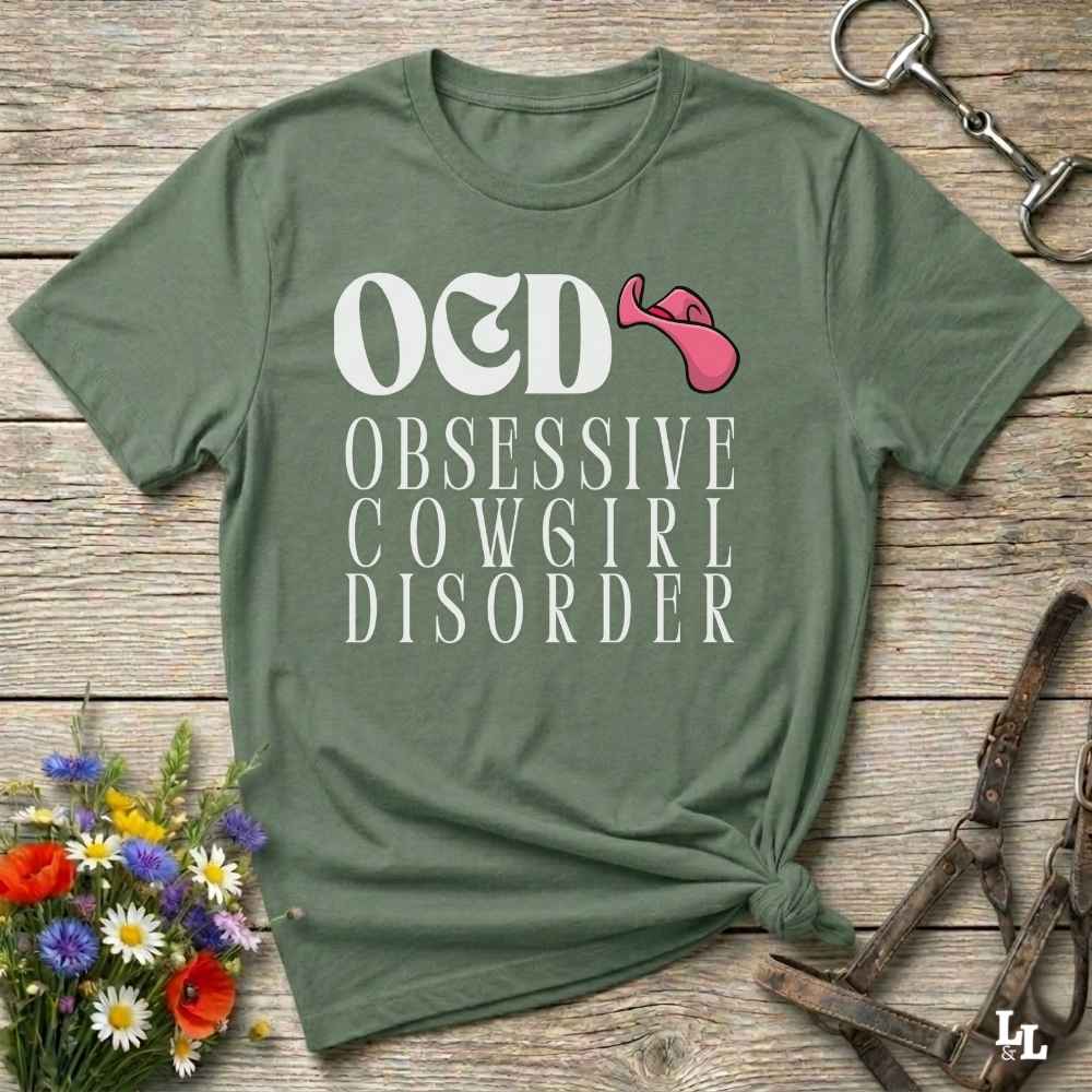 Fun western t-shirt for horse lovers and cowgirls. Western cowgirl graphic tee with horse design. Cowboy humor t-shirt for rodeo and country lovers. Horse lover funny t-shirt with western theme. Country style horse graphic tee for cowboys and cowgirls. Retro style funny western shirt for equestrians. Cute and funny country shirt with horse print. Southern cowgirl funny quote shirt for horse lovers. OCD Cowgirl.
