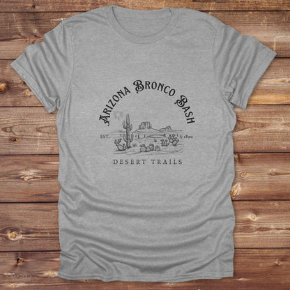 Fun western t-shirt featuring horse themed design for cowgirls, cowboys, horse lovers and equestrians, perfect for rodeo lovers, rustic style fans, and horse people. Unique graphic tee by Lasso and Loom. Arizona Bronco Bash Desert Trails.