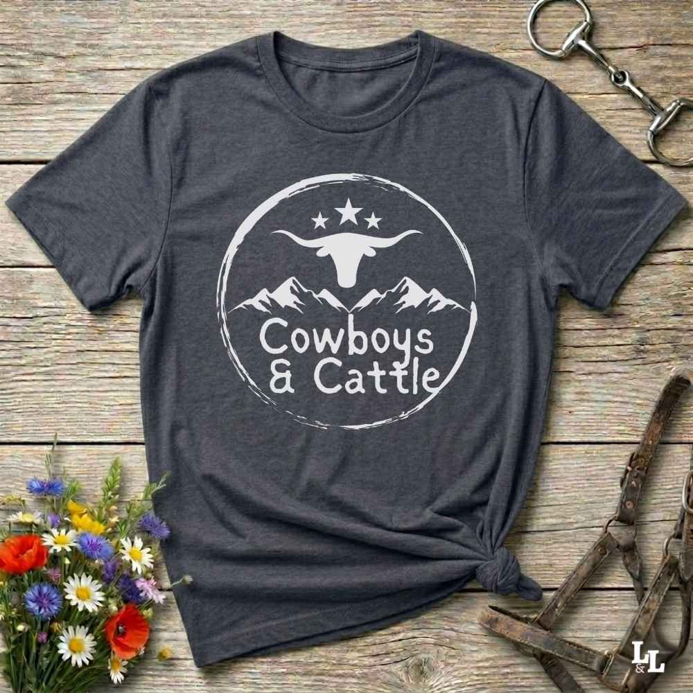 Fun western t-shirt featuring horse themed design for cowgirls, cowboys, horse lovers and equestrians, perfect for rodeo lovers, rustic style fans, and horse people. Unique graphic tee by Lasso and Loom.  Cowboys and cattle with mountain range and longhorn skull.