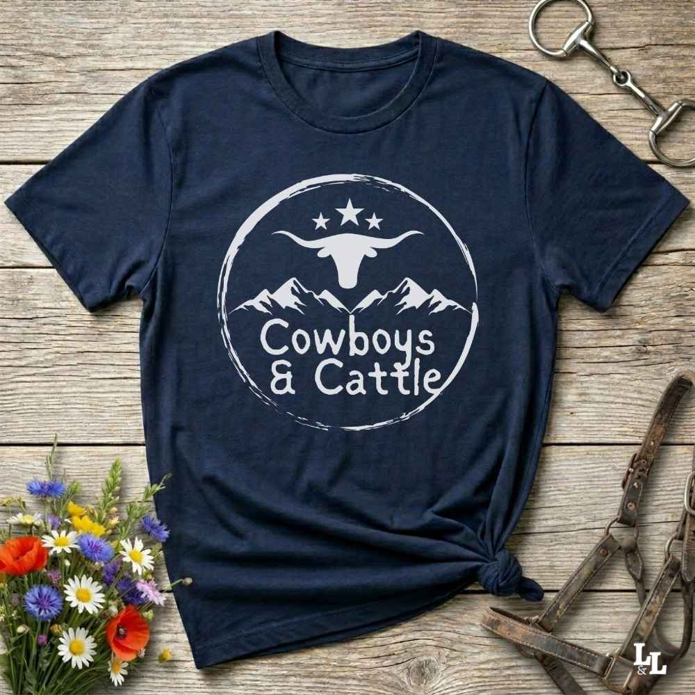 Fun western t-shirt featuring horse themed design for cowgirls, cowboys, horse lovers and equestrians, perfect for rodeo lovers, rustic style fans, and horse people. Unique graphic tee by Lasso and Loom.  Cowboys and cattle with mountain range and longhorn skull.