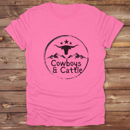 Fun western t-shirt featuring horse themed design for cowgirls, cowboys, horse lovers and equestrians, perfect for rodeo lovers, rustic style fans, and horse people. Unique graphic tee by Lasso and Loom.  Cowboys and cattle with mountain range and longhorn skull.
