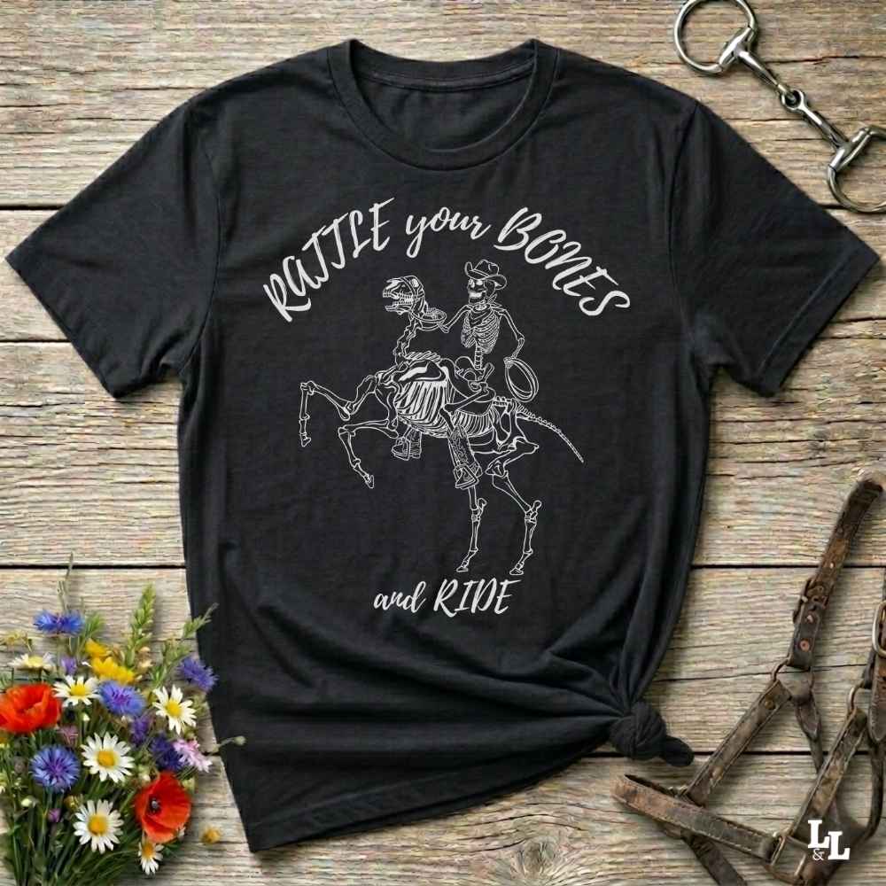 Fun western t-shirt featuring horse themed design for cowgirls, cowboys, horse lovers and equestrians, perfect for rodeo lovers, rustic style fans, and horse people. Unique graphic tee by Lasso and Loom.  Rattle your bones and ride.