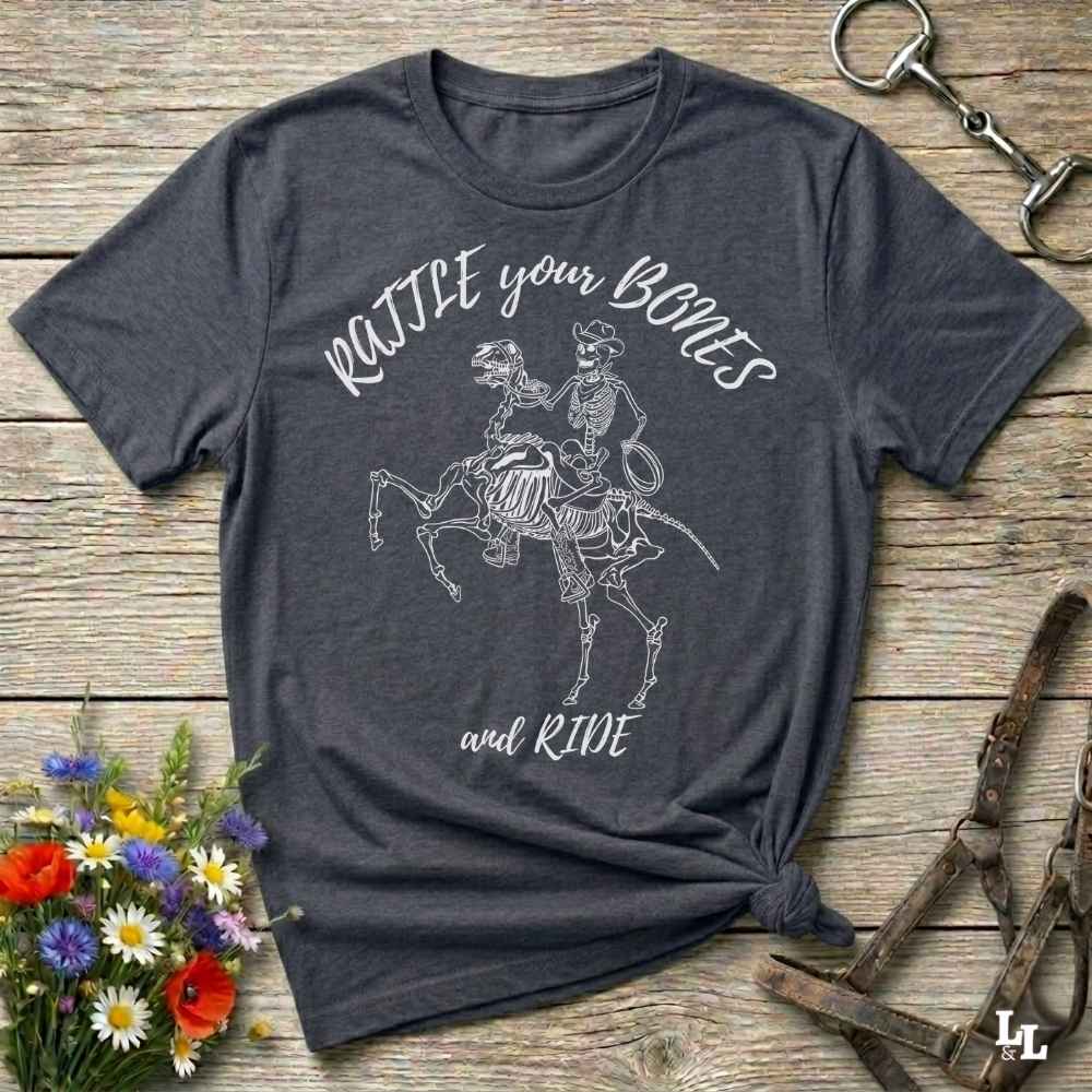 Fun western t-shirt featuring horse themed design for cowgirls, cowboys, horse lovers and equestrians, perfect for rodeo lovers, rustic style fans, and horse people. Unique graphic tee by Lasso and Loom.  Rattle your bones and ride.