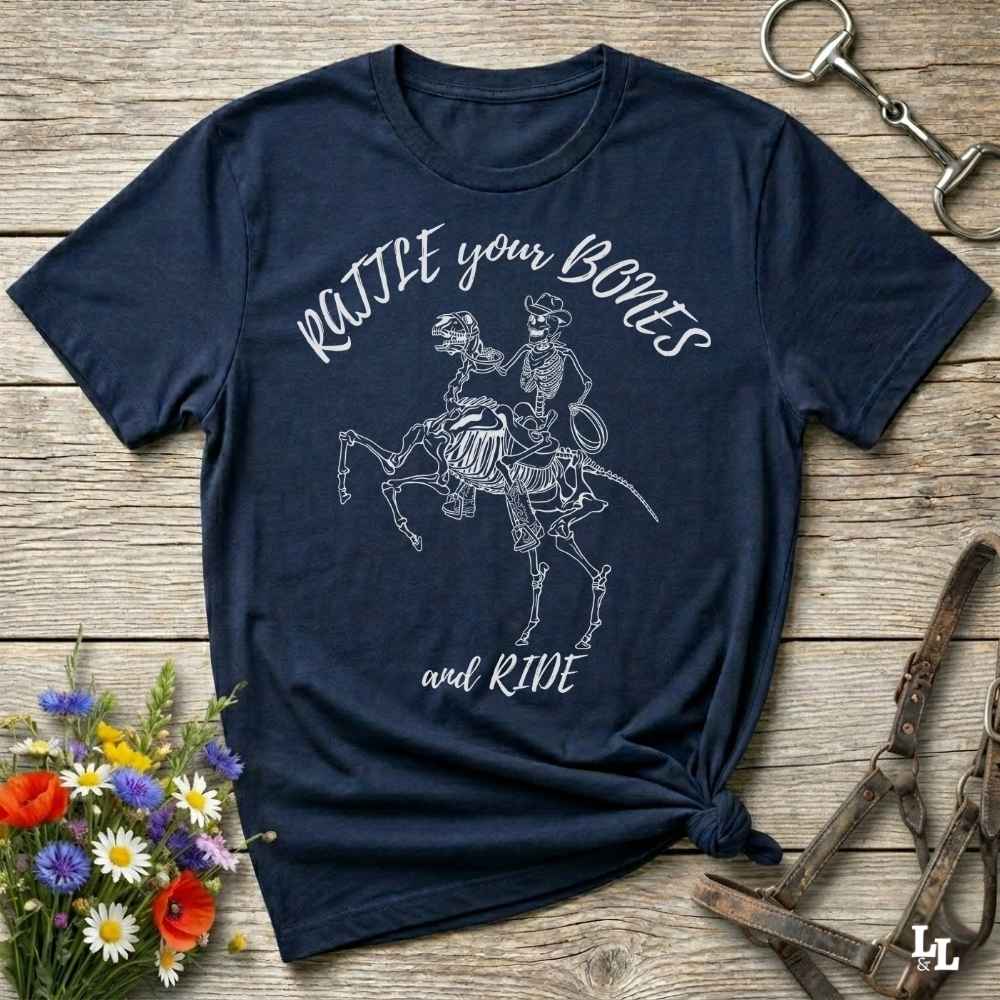 Fun western t-shirt featuring horse themed design for cowgirls, cowboys, horse lovers and equestrians, perfect for rodeo lovers, rustic style fans, and horse people. Unique graphic tee by Lasso and Loom.  Rattle your bones and ride.