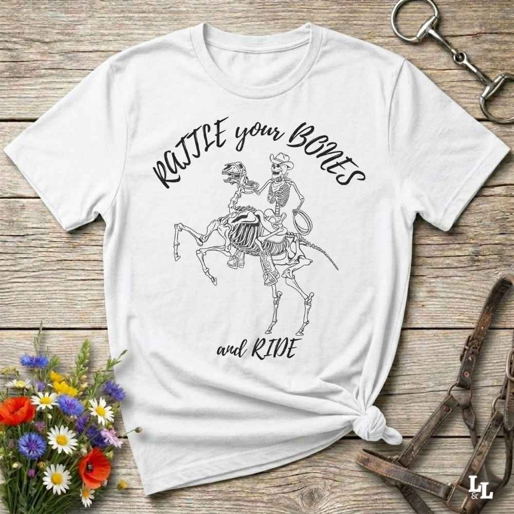 Fun western t-shirt featuring horse themed design for cowgirls, cowboys, horse lovers and equestrians, perfect for rodeo lovers, rustic style fans, and horse people. Unique graphic tee by Lasso and Loom.  Rattle your bones and ride.