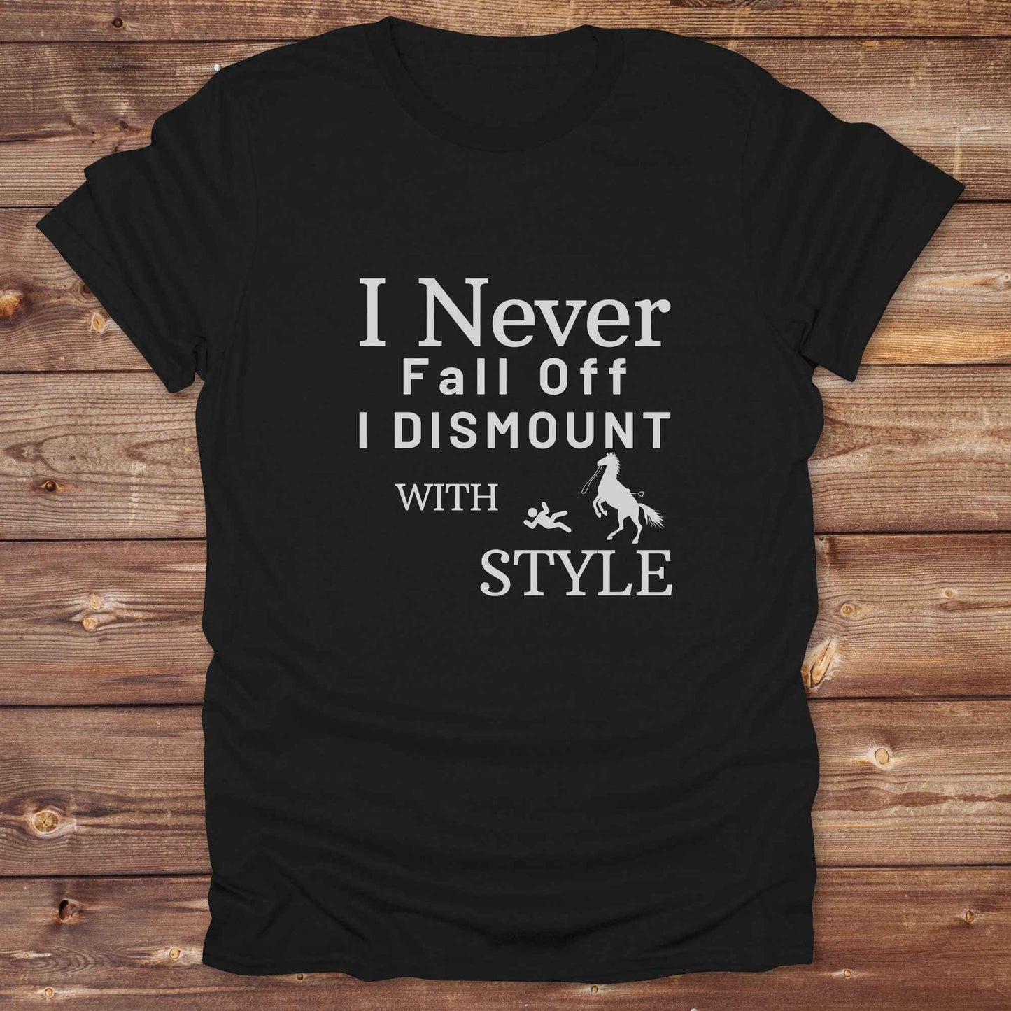 Fun western t-shirt featuring horse themed design for cowgirls, cowboys, horse lovers and equestrians, perfect for rodeo lovers, rustic style fans, and horse people. Unique graphic tee by Lasso and Loom.  I never fall off I dismount in style.