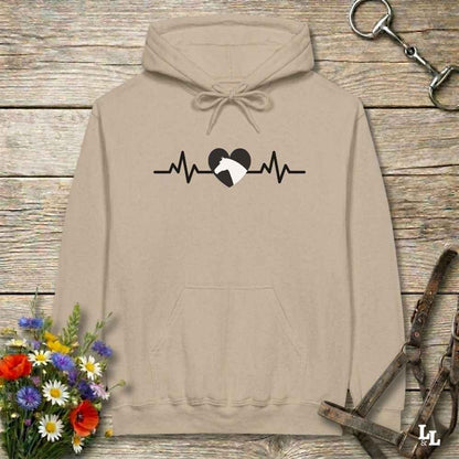 Beige  hoodie with text Heartbeat line and a horse head, on wooden background with equestrian bit and halter and flowers