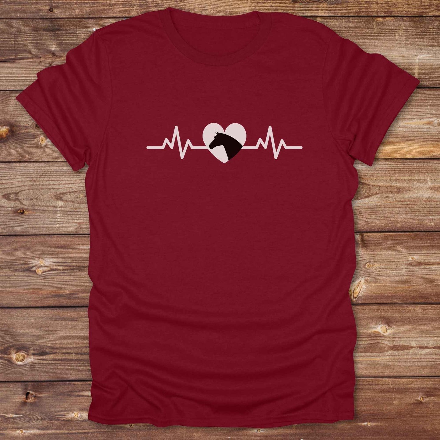 Fun western t-shirt featuring horse themed design for cowgirls, cowboys, horse lovers and equestrians, perfect for rodeo lovers, rustic style fans, and horse people. Unique graphic tee by Lasso and Loom. Heartbeat with a horse in black.